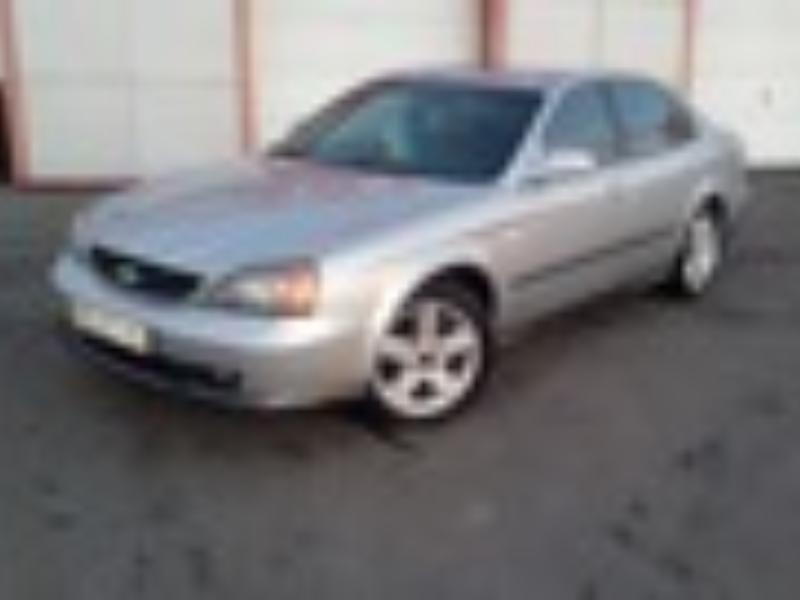 ФОТО Карта двери для Chevrolet Evanda V200 (09.2004-09.2006)  Киев