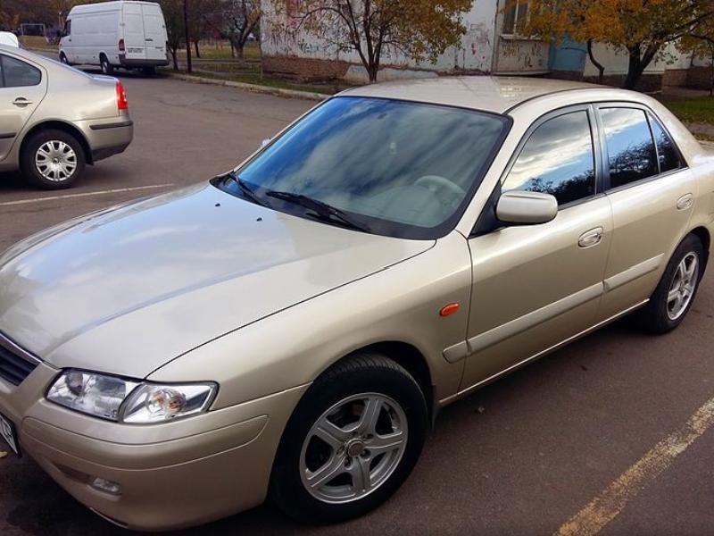 ФОТО Бампер задний для Mazda 626 GF/GW (1997-2002)  Киев