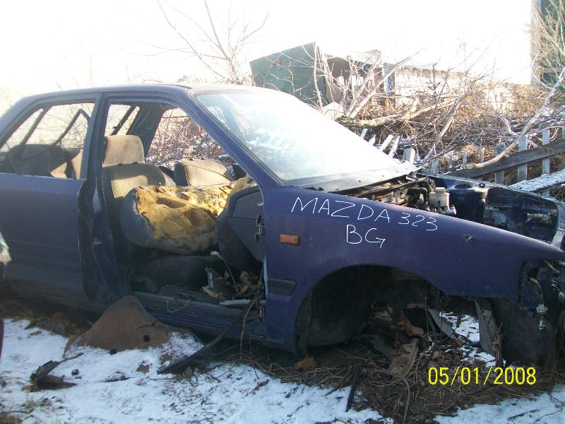 ФОТО Переключатель поворотов в сборе для Mazda 323 BG (1989-1994)  Киев