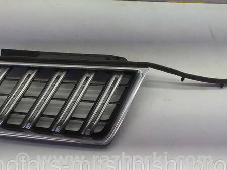 ФОТО Решітка радіатора ліва для Mitsubishi L200 (06-14) Коломия