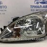 Фара ліва галоген Mitsubishi Lancer
