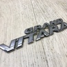 Эмблема Suzuki Grand Vitara