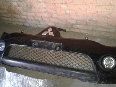 Бампер передний для Mitsubishi L200 Ровно
