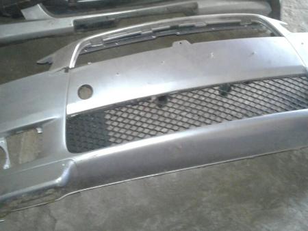 Бампер передний для Mitsubishi Lancer X 10 (08-17) Ровно