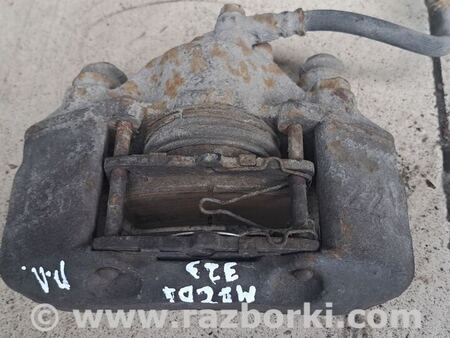 Суппорт передний левый для Mazda 323 BH, BA (1994-2000) Киев B4623399ZB
