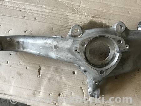 Кулак поворотный левый для Tesla Model 3 Белая Церковь 1044311-00-E